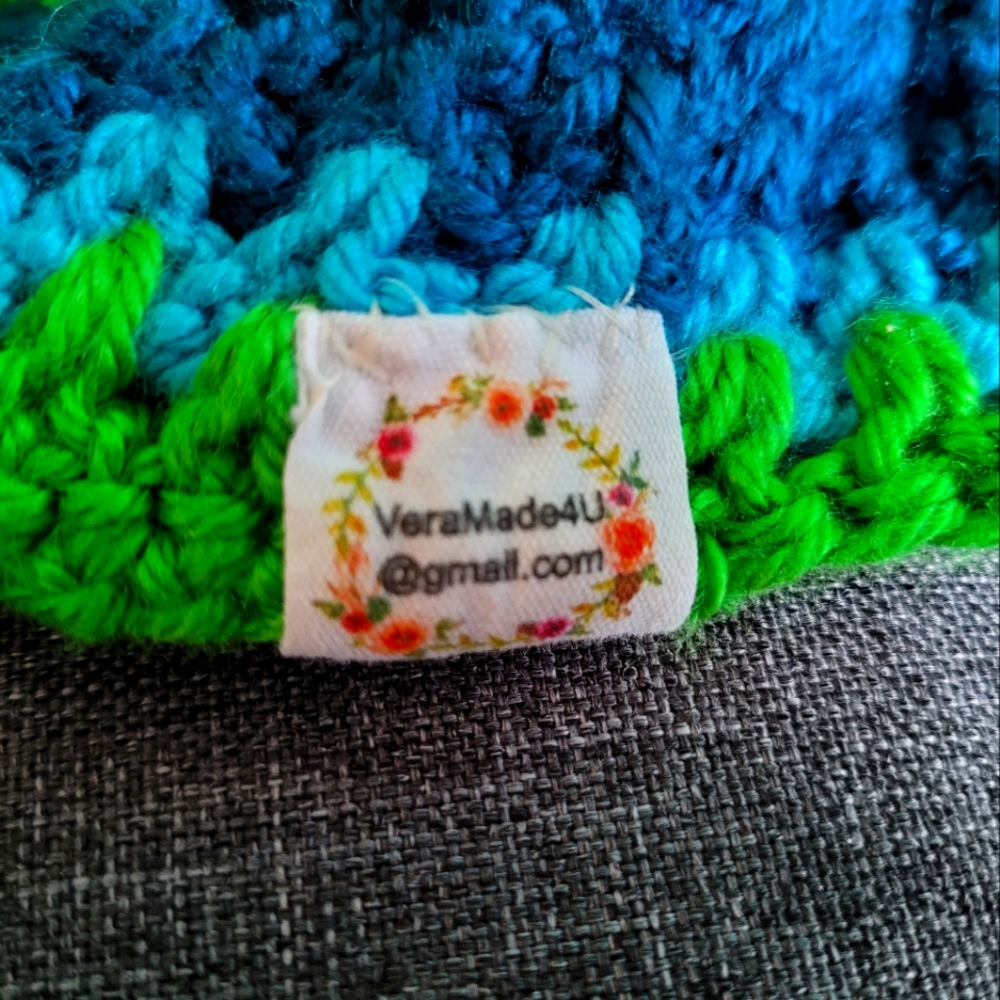 A beautiful crocheted blanket for shall or lap or new born perfect for car, etc